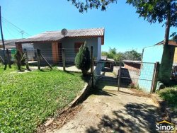 Terreno com 02 casas no bairro Rondônia 