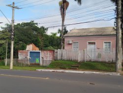 Terreno com 1.539m² com construção no bairro Rondônia