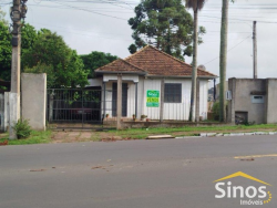 Terreno com 485,64m² com construção no bairro Rondônia