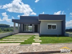 Casa com 03 dormitórios no condomínio Moradas da Lomba