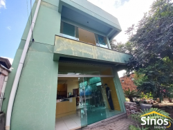 Prédio comercial com casa no bairro Guarani