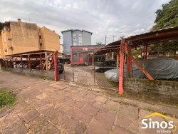 Terreno de esquina com construção 120m² no bairro Boa Vista