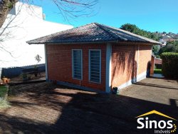 Terreno com prédio comercial no bairro Ideal