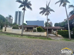 Terreno com construção no bairro Jardim Mauá 